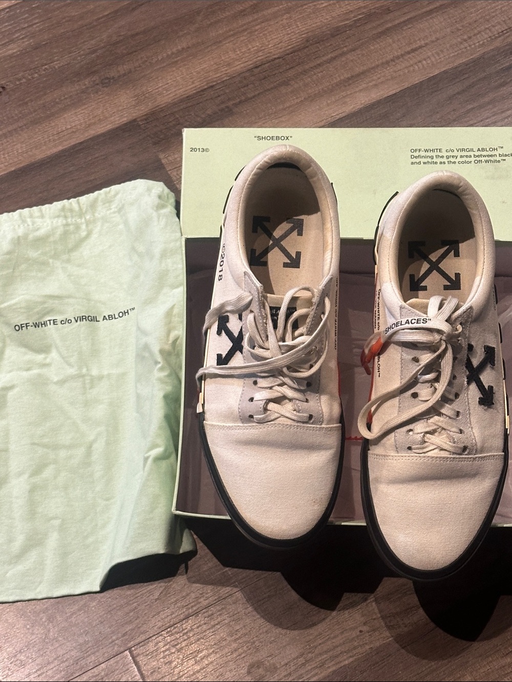 Off-White Cream Canvas Low-Top Sneakers with Black Arrows and Orange Zip Tie